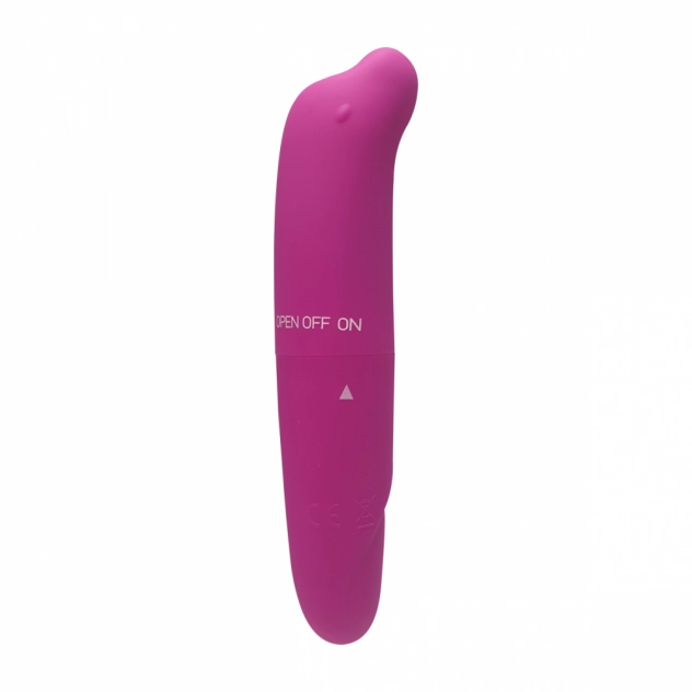 Vibrador roxo, com a ponta em formato de golfinho virada para o lado direito. No meio do vibrador tem escritos de 